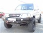 Přední pevnostní nárazník Mitsubishi Pajero III (00-06) bez bullbaru Přední pevnostní nárazník Mitsubishi Pajero III (00-06) bez bullbaru