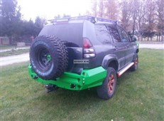 Zadní pevnostní nárazník Toyota LC 120 s držákem rezervy (5dv.)