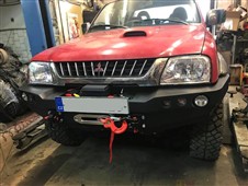Přední pevnostní nárazník Mitsubishi L200 (96-05) bez bullbaru
