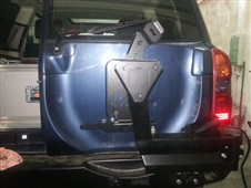 Držák rezervního kola pro pevnostní nárazník Nissan Patrol Y61